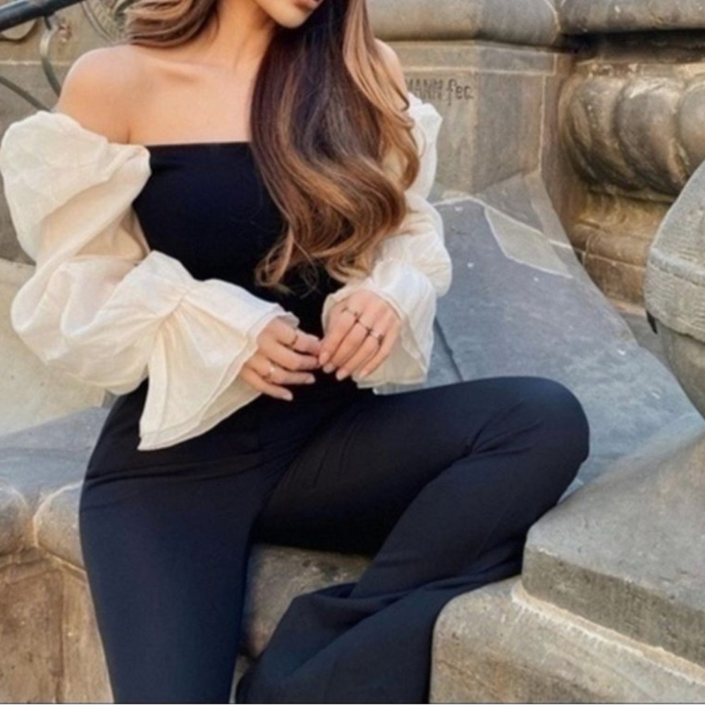 Zara Chic off-shoulder topcream sleeves. Perfect for stylish outings.